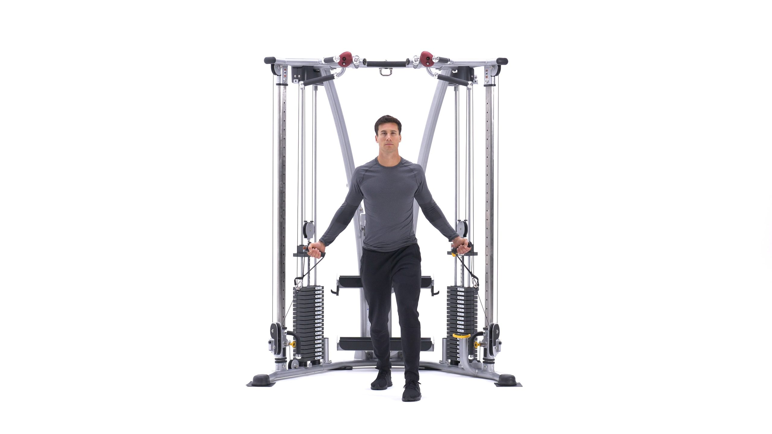 تصویر ابتدای حرکت کراس اور سیم بالا با تمرکز بر تنظیم بدن و کشش عضلات.